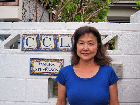 Akiko Tamura poses in front of her home in Yokohama. | COURTESY OF AKIKO TAMURA