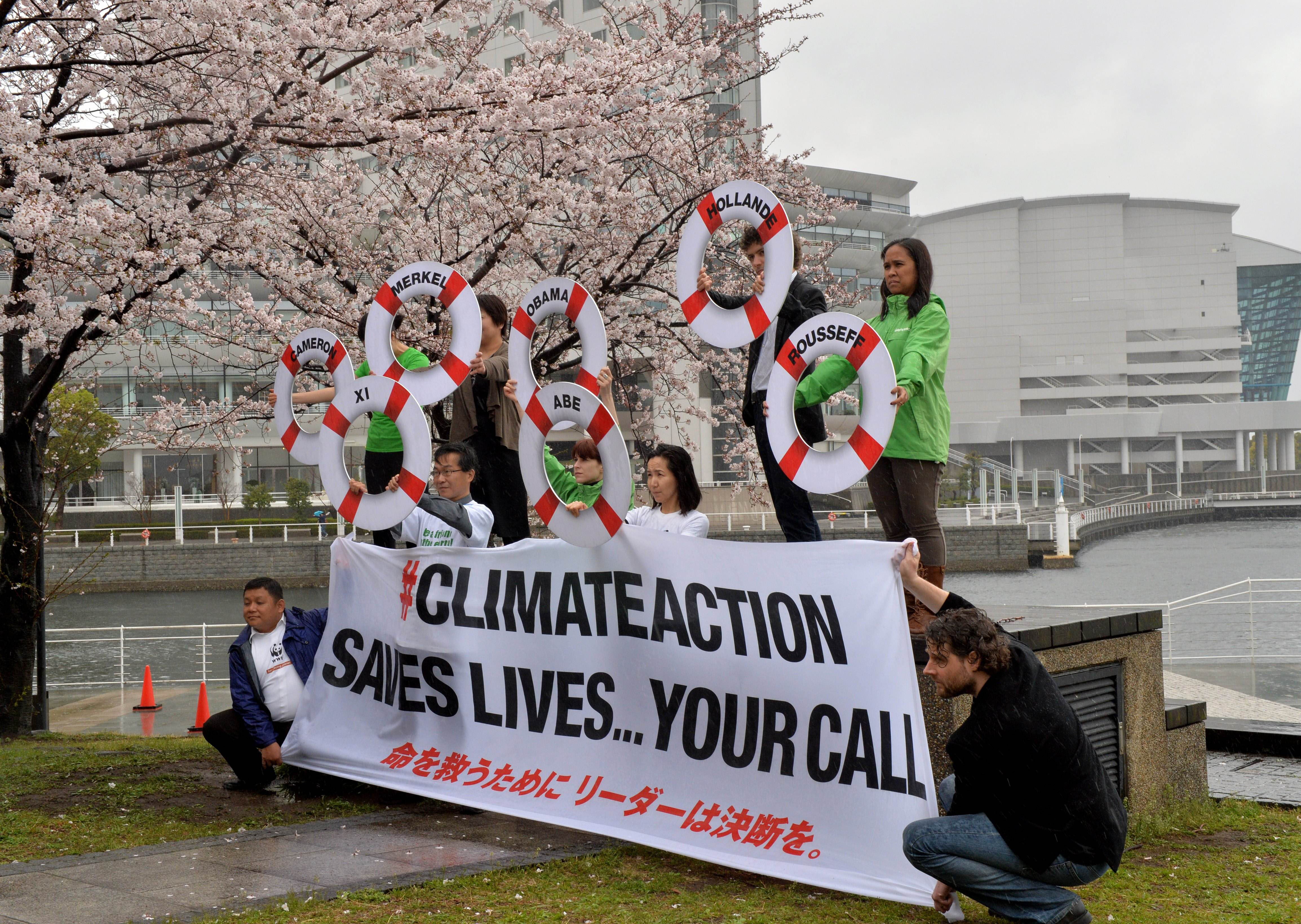 Environmental activists protest against global warming in Yokohama on March 30. | AFP-JIJI